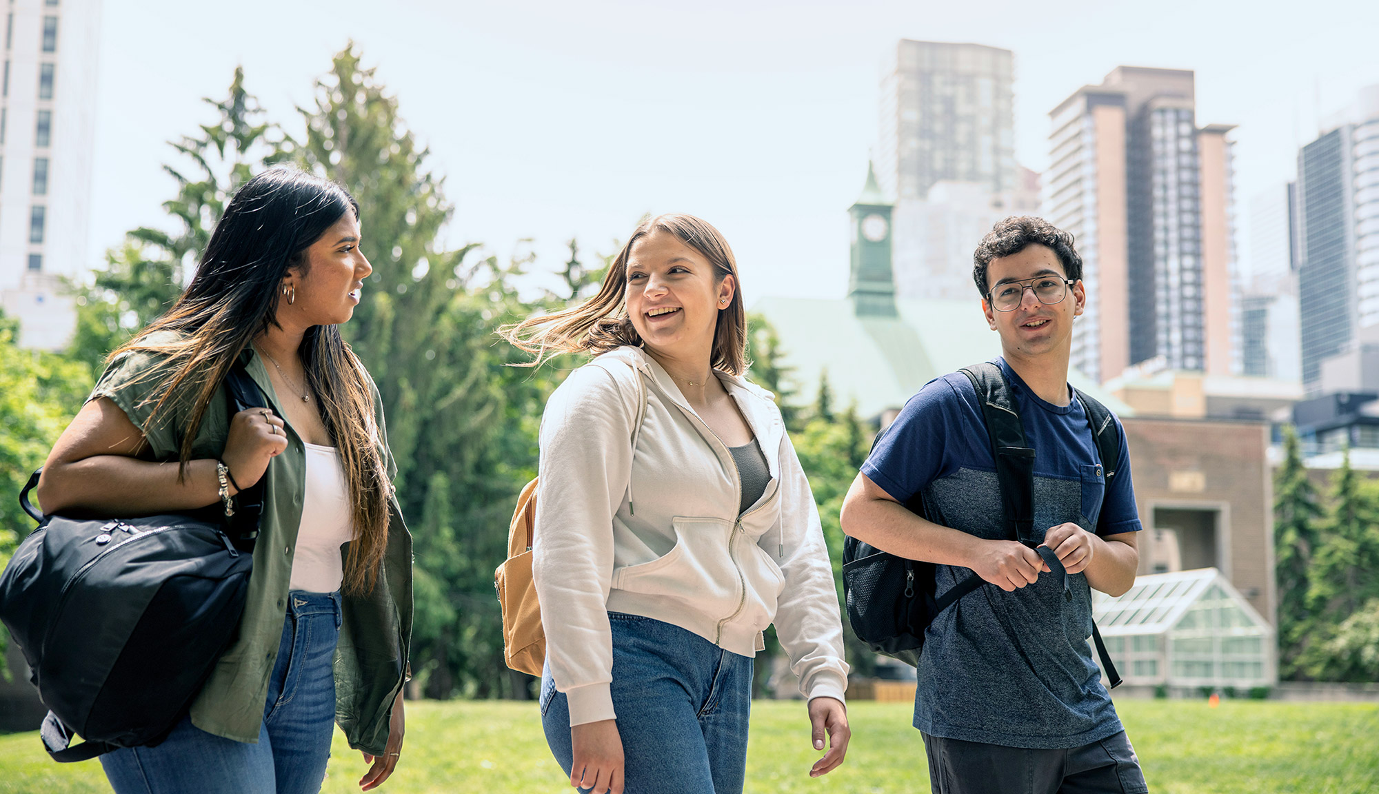 students walking through the TMU courtyard