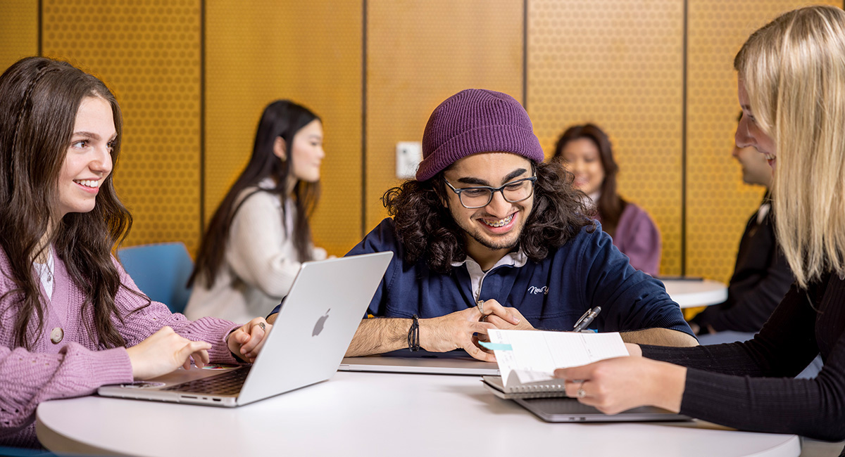 Students studying as a group at a table
