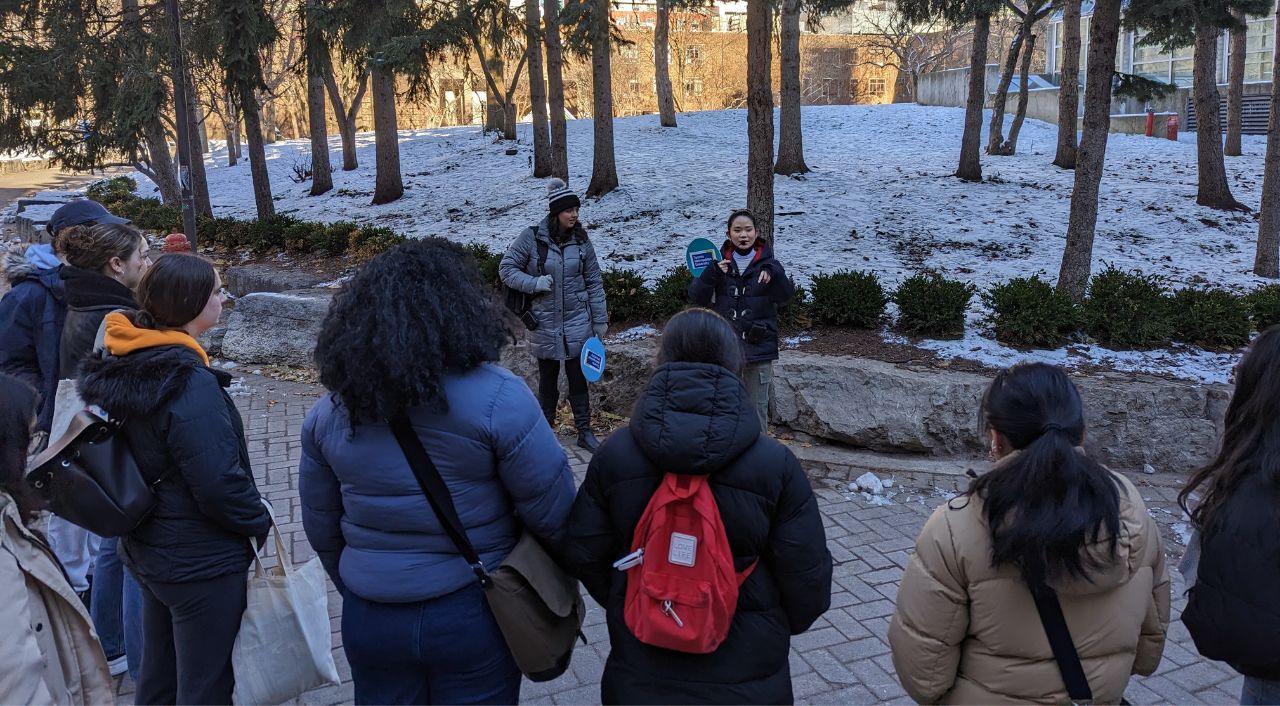 HTM students on a campus tour by the quad