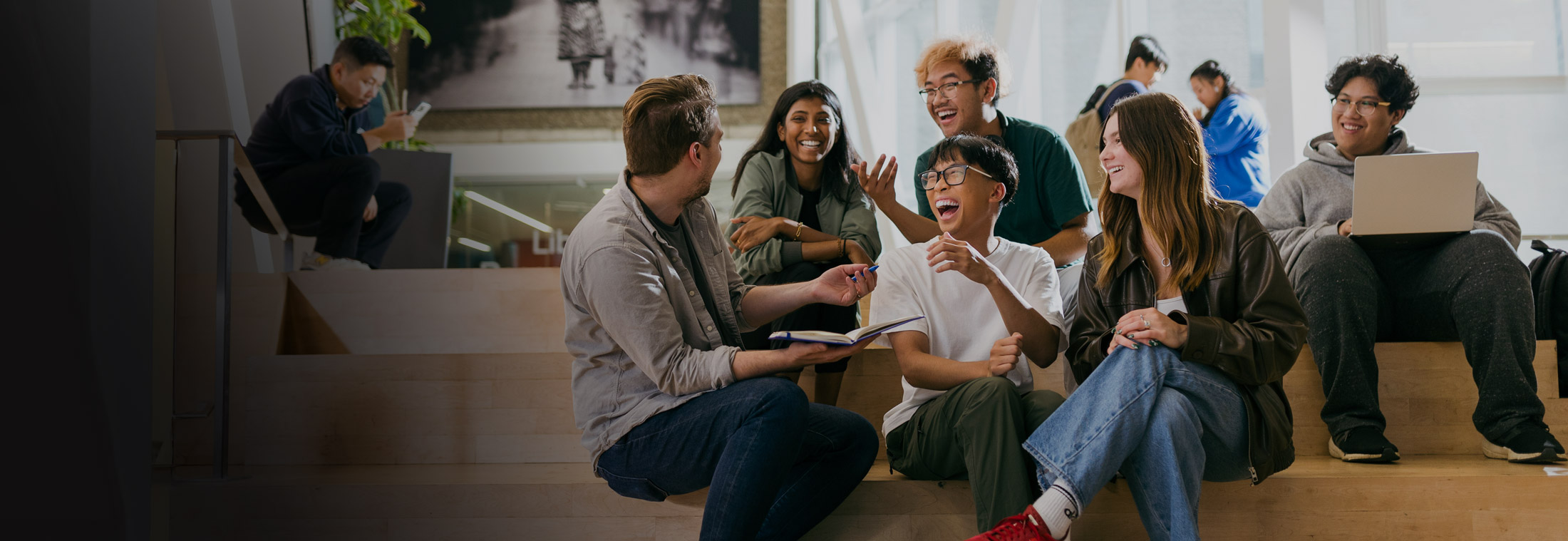 Students gathered at the SLC, talking and laughing