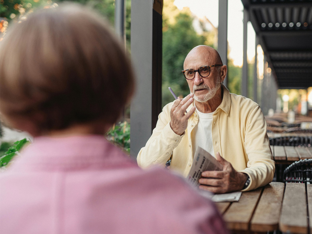 Elderly couple at a restaurant in the country side
