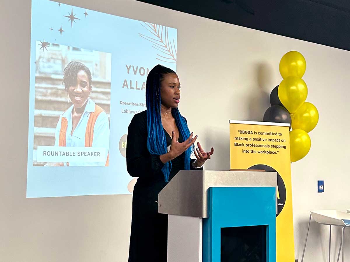Alexis Stackhouse, vice president of Ted Rogers Black Business Graduate Student Association welcoming guests to the event.