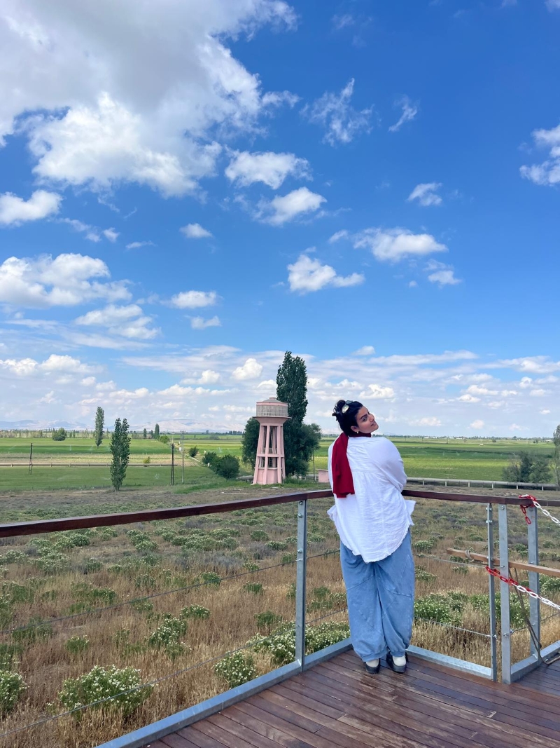 student posing in front of countryside in Turkey