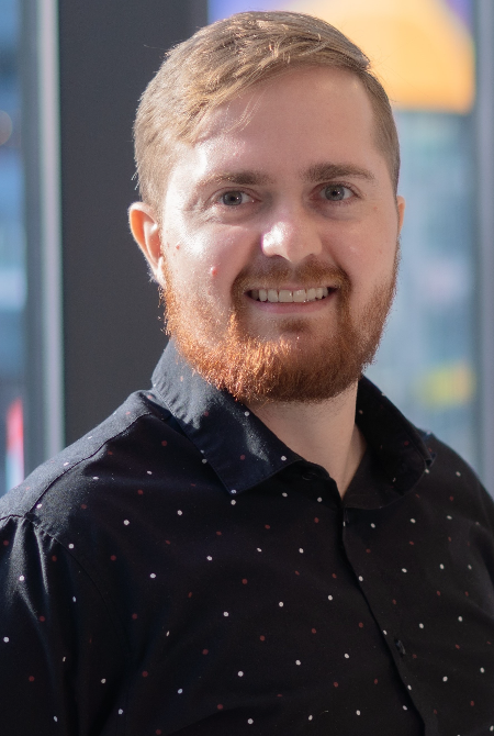 A portrait photo of Conor Kelly, the writing and language specialist