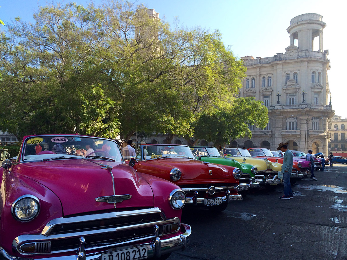 Line of vintage cars in Cuba