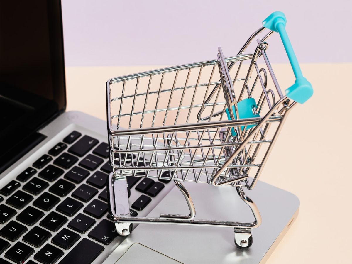 Shopping cart on top of laptop