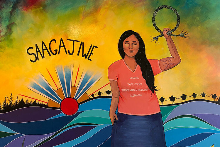 An artistic mural featuring the logo of Saagajiwe