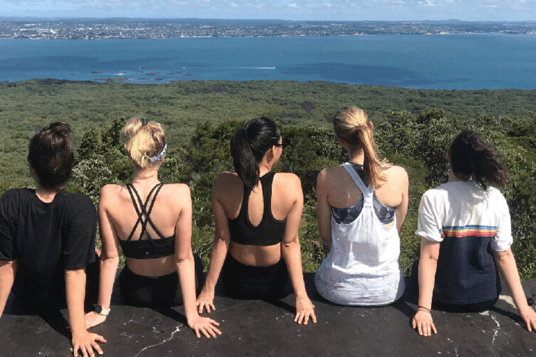 Student looking  at the landscape from a viewpoint