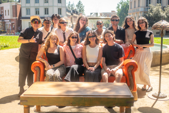 Group of students smiling in a outdoor space in Los Angeles