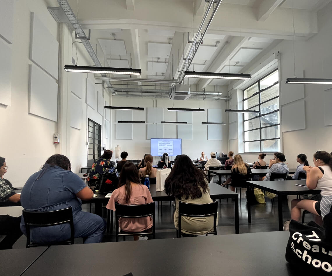 Students in classroom listening to a lecture