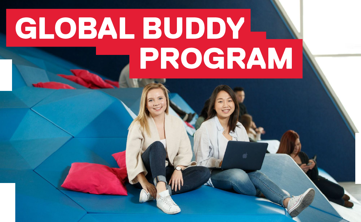 Two students sitting together with Global Buddy Program titled above