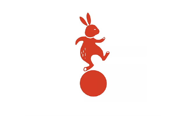orange bunny on a spinning wheel