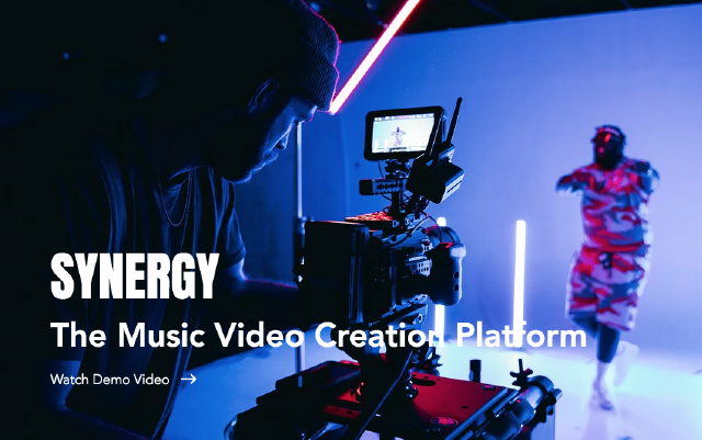 synergy the music video creation platform watch demo video, a videographer looking behind the screen while a performer is in action
