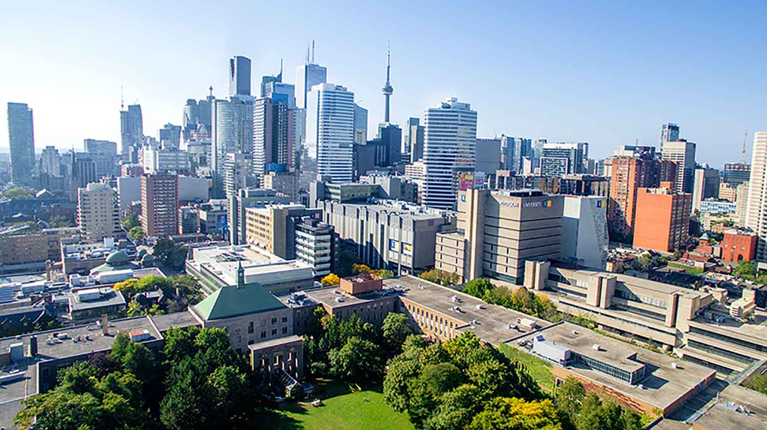 An aerial view of the Ryerson Quad and surrounding buildings, including Kerr Hall, the Library and the CN Tower in the distance