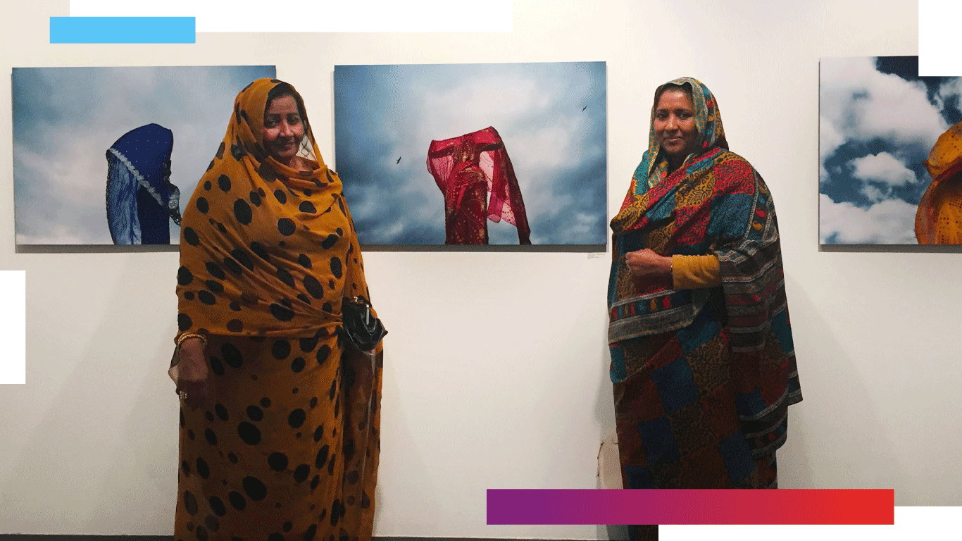Two students at a photography exhibit