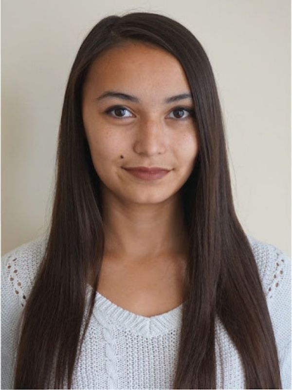 Producer of The Sessions, Samantha McNulty. She has brown hair and is looking into the camera