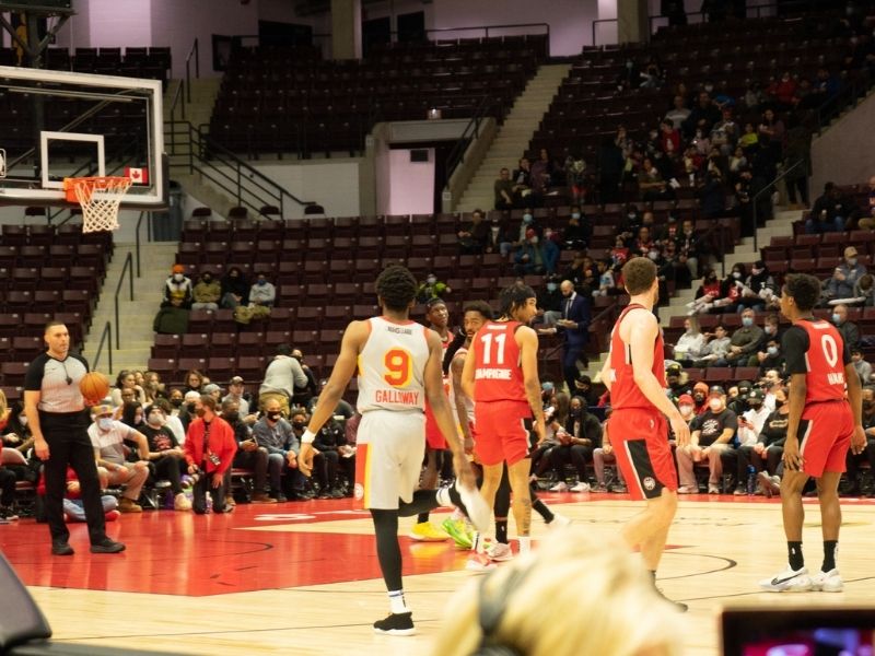Basketball game between the Raptors 905 in red jerseys and the Skyhawks in white jerseys