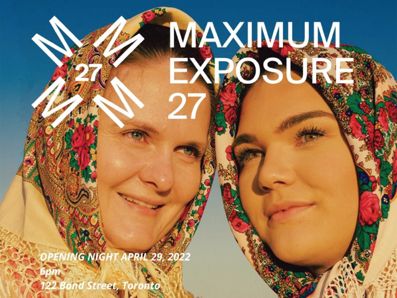 Maximum Exposure Save the Date flyer featuring two women in gold silk headscarves with floral prints