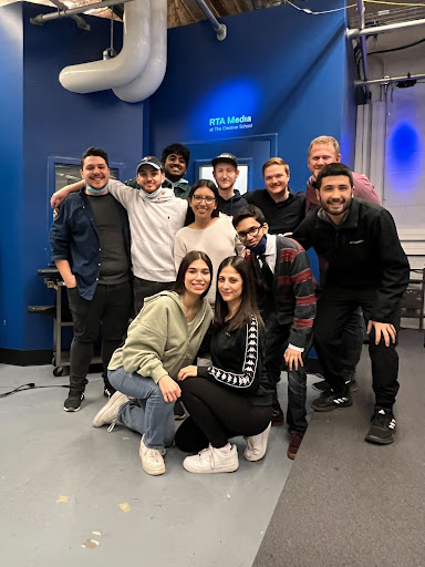 A group of students standing together and posing for the camera.