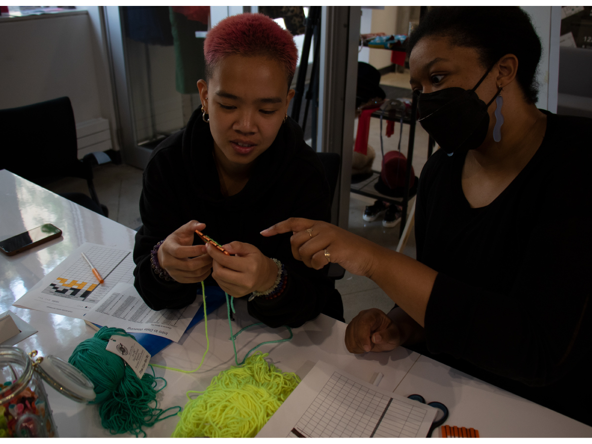 Students at camp discussing their design project