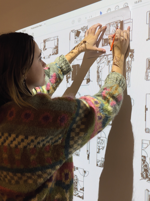 Students participate in an activity at the launch of the Assembly Gallery