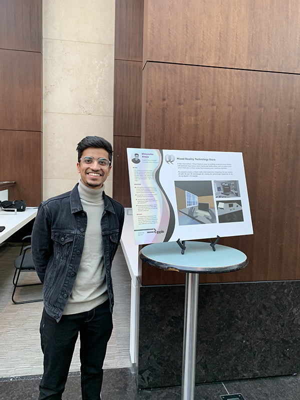 MDM candidate Himanshu Aneja with his mixed reality technology display at Industry Day