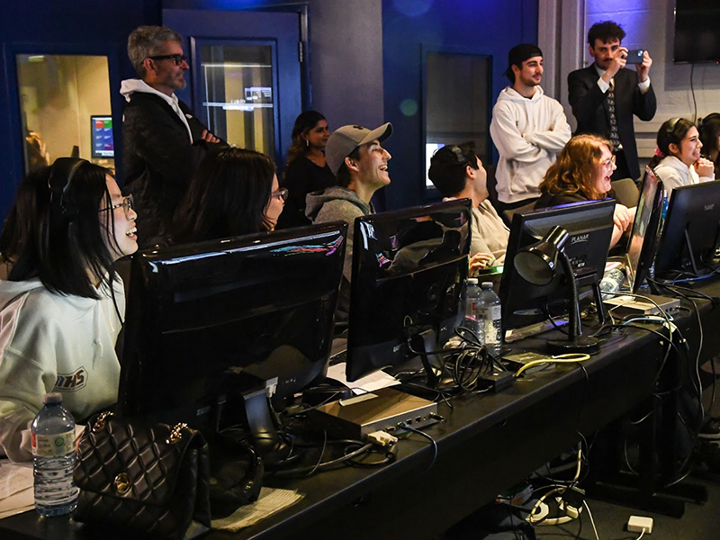 People sit in a computer lab