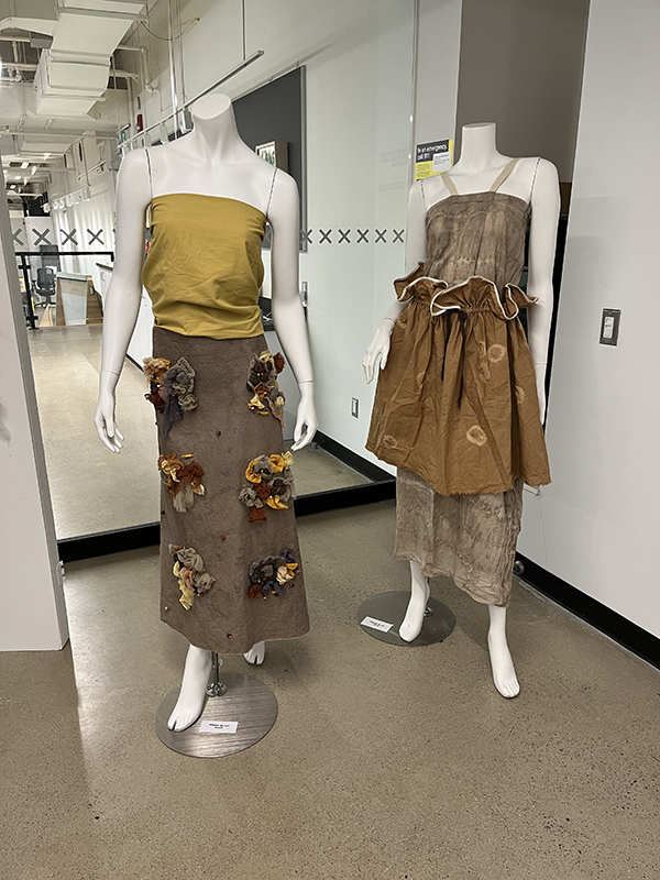 A student project with earth coloured garments titled "Flora and Fungi"