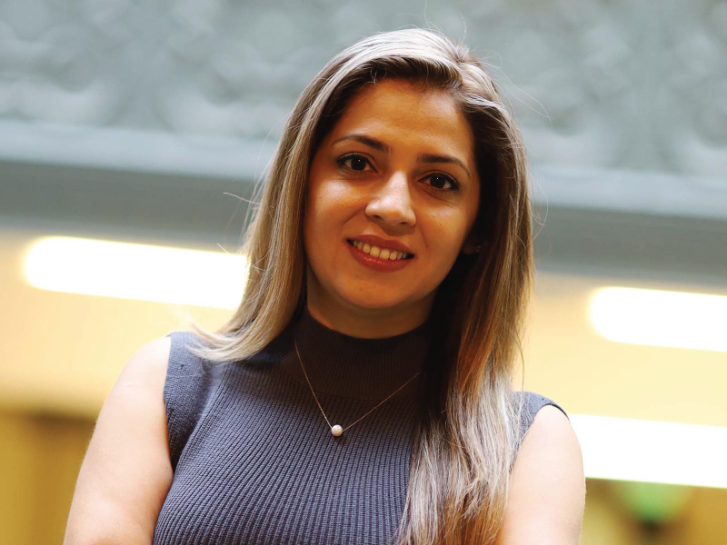 Portrait of RTA Media Professor Afsoon Soudi smiling into the camera