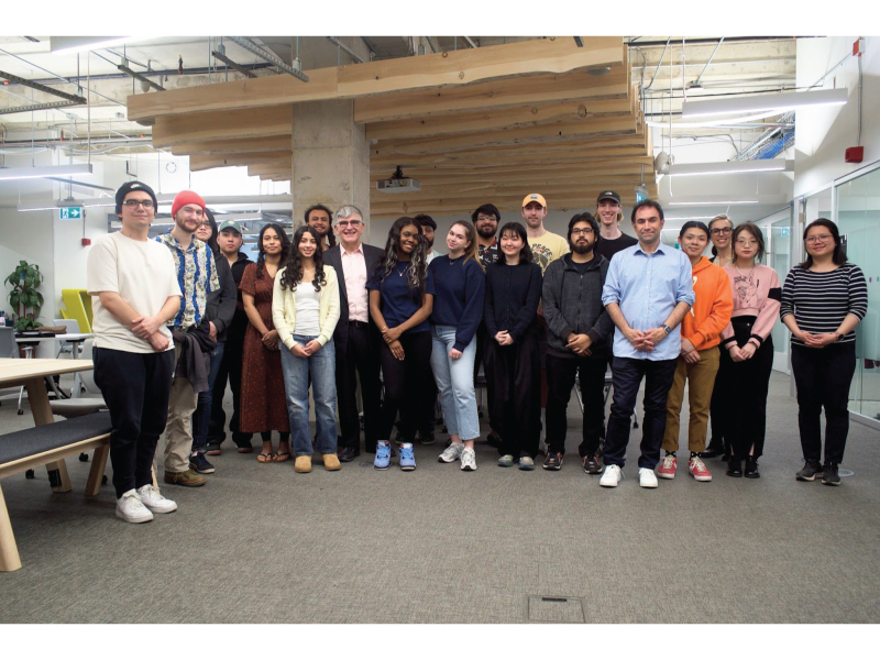 The Winter 2023 cohort for the Creative AI course. Hossein Rahnama stands with students