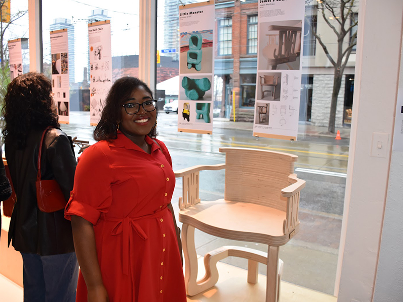 4th-year student Jewel Mathieu is pictured with the chair she created in Interior Design Studio 8.