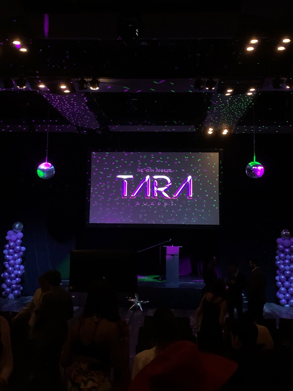 a screen with TARA in purple letters