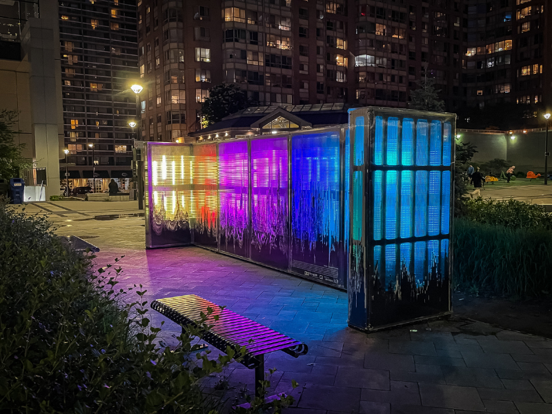 Night photo of the LED Sculpture lit with different colors 
