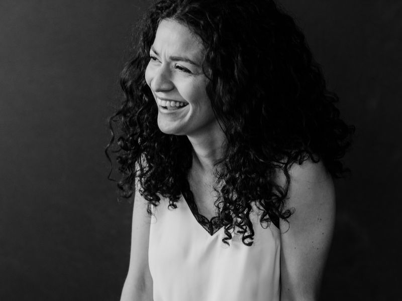 Angelica Stirpe smiling looking away