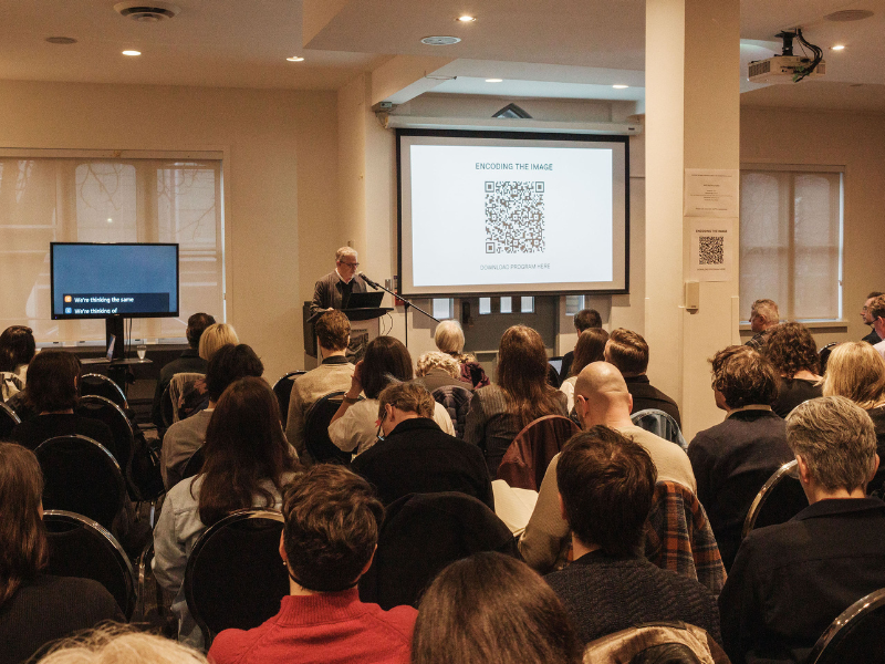 Group of people in art gallery.