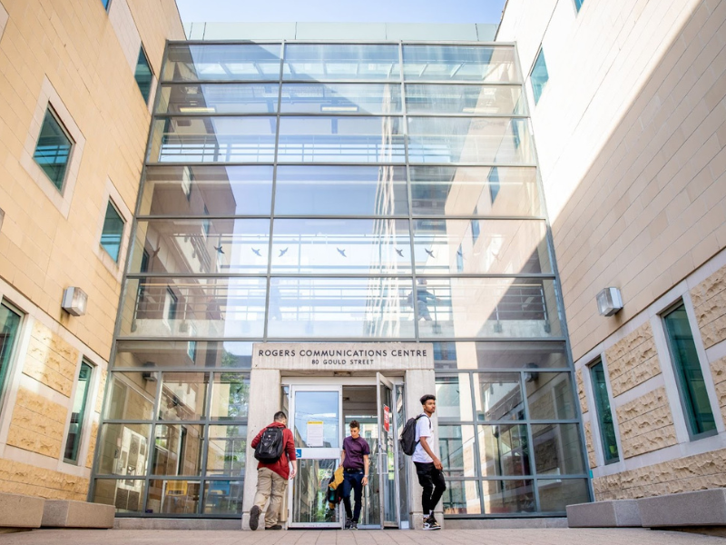 A wide shot of a building with "Rogers Communication Centre" written on it.