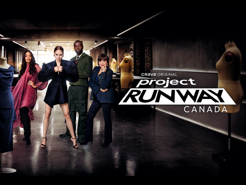 A photo showing the three Project Runway Canada judges and mentor Aurora James posing in a sewing lab. 