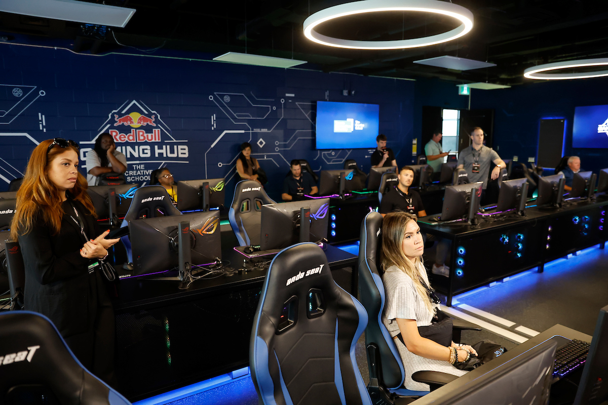 Guests are pictured around the room in the Red Bull Gaming Hub.