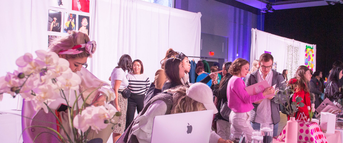 Students interacting in a creative showcase