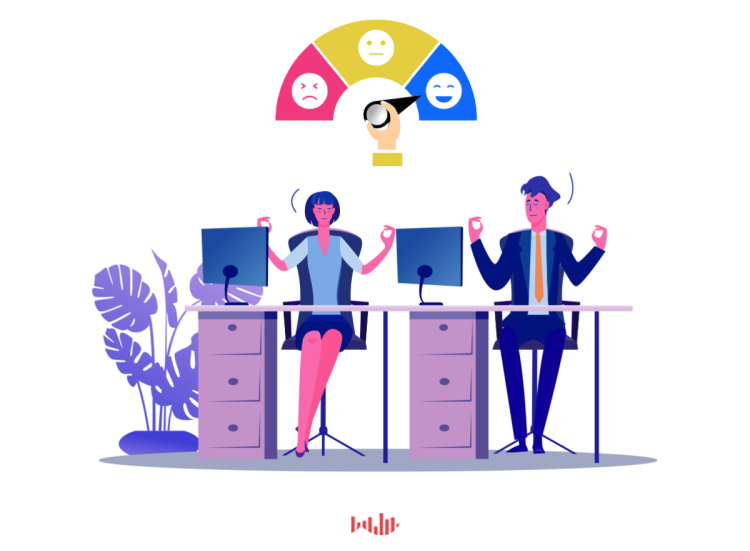 woman and man meditating at office desk