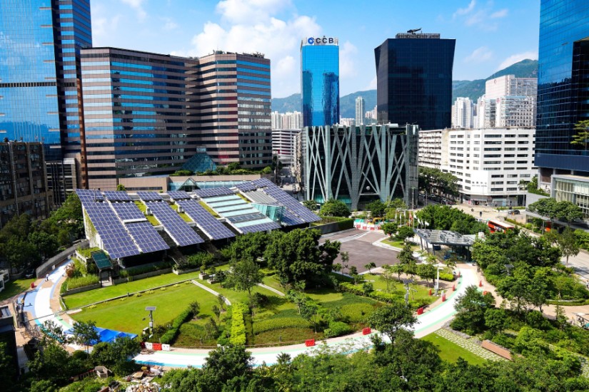 Solar grids with skyscrapers behind