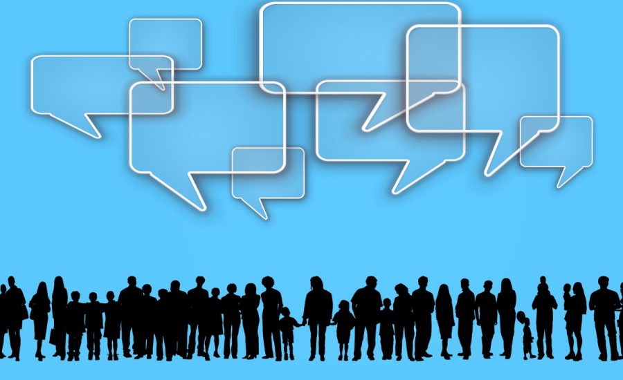 conversation balloons on top of group of people