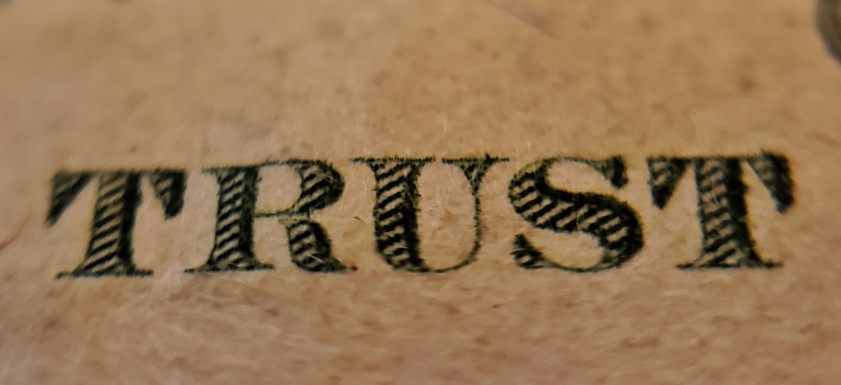 Letters TRUST woven on a mat