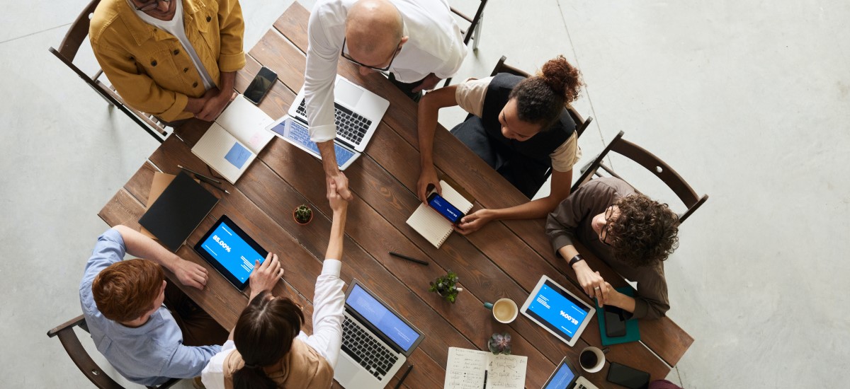 two people shaking hands in agreement