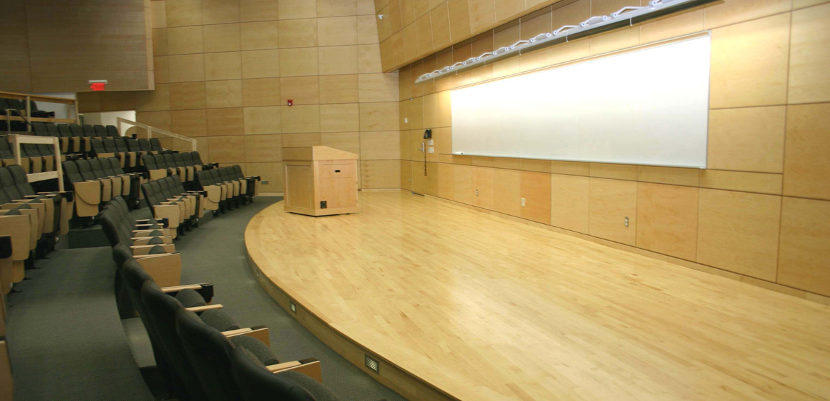 Podium and screen in ENG 103 lecture hall