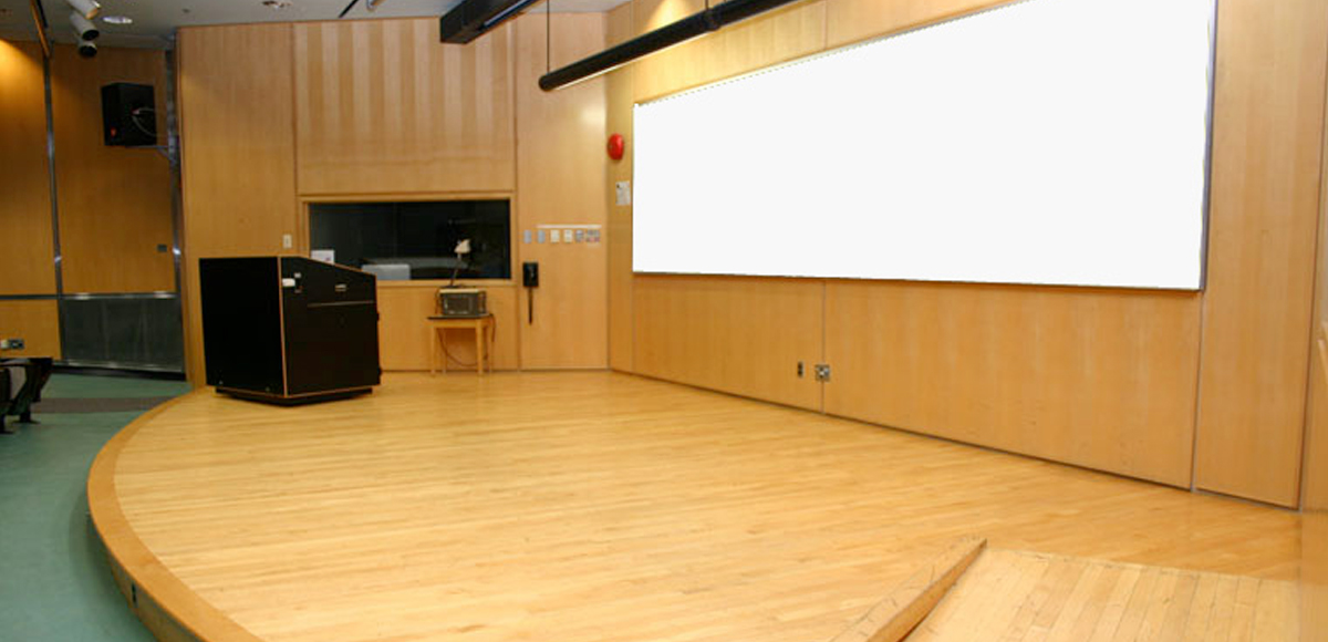 Podium and screen in RCC 204 classroom