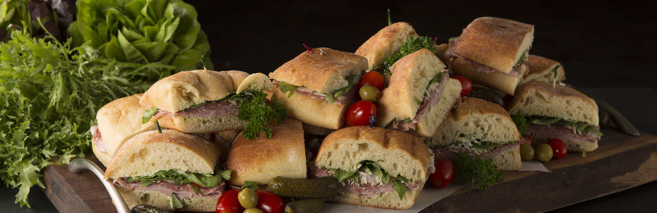 A platter of fresh sandwiches by Ryerson Eats catering.