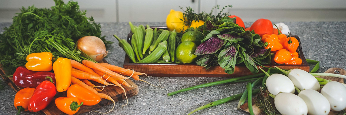 Harvest Collective and Learning Circle crops are displayed on a kitchen counter.