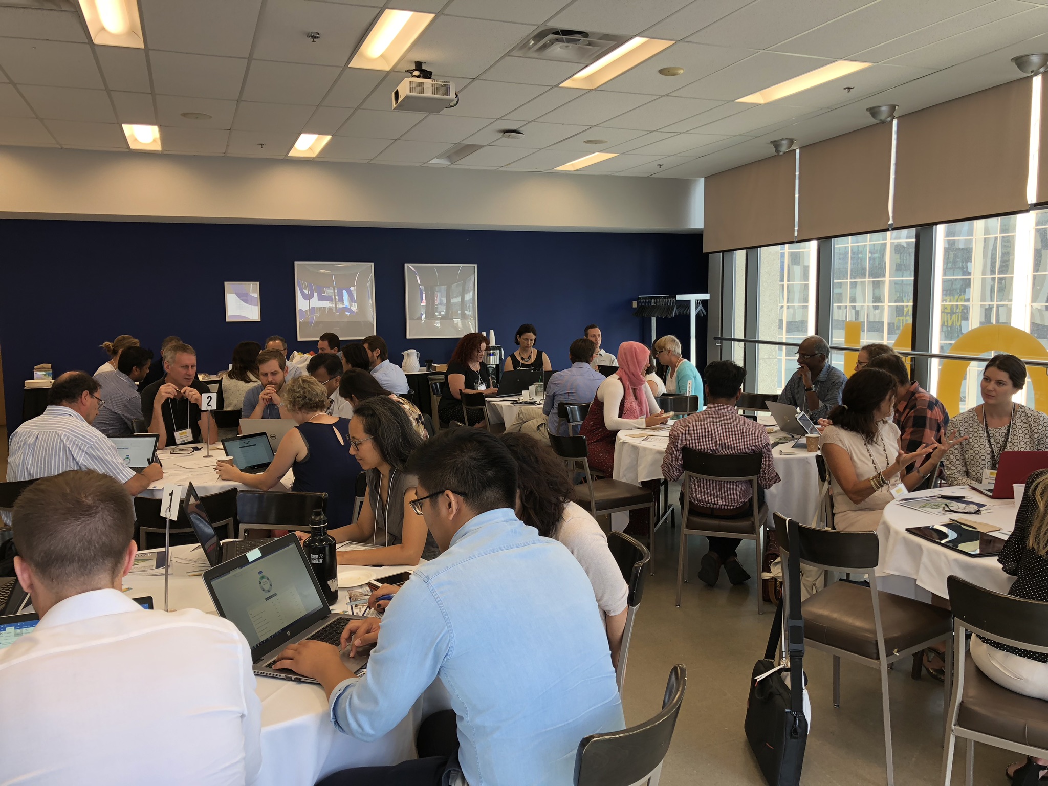 people networking at round tables 