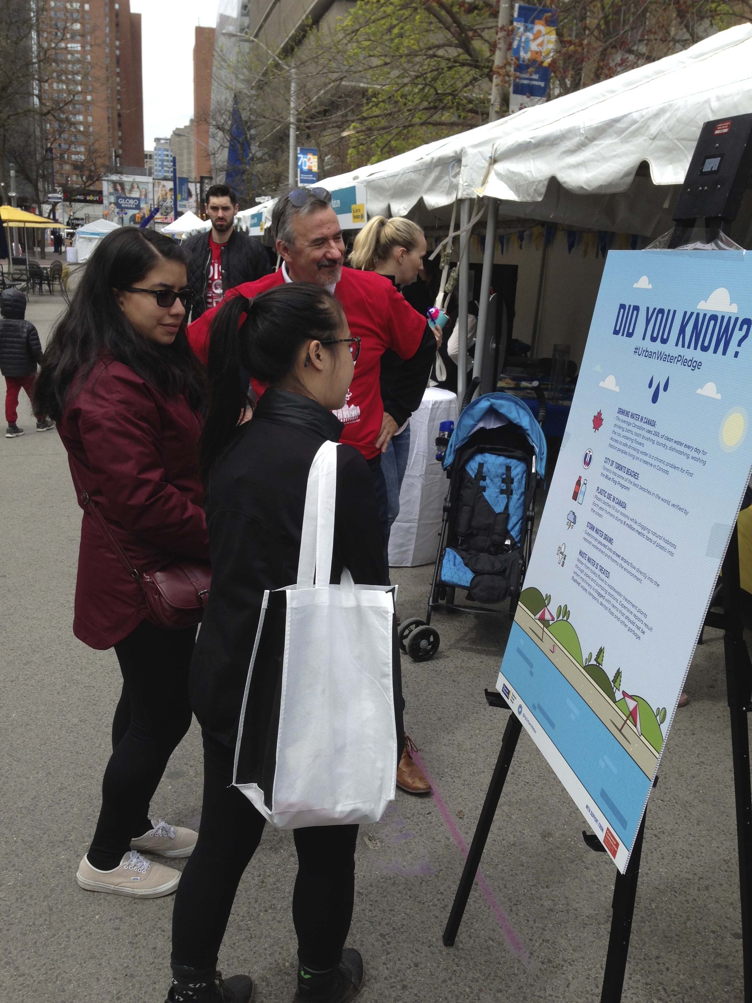 nick explaining the water pledge to citizens